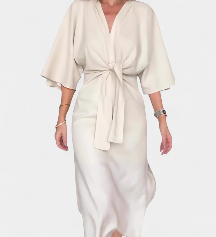 Natalija – laisvai krintanti suknelė su V formos iškirpte ir priekyje esantis mazgas