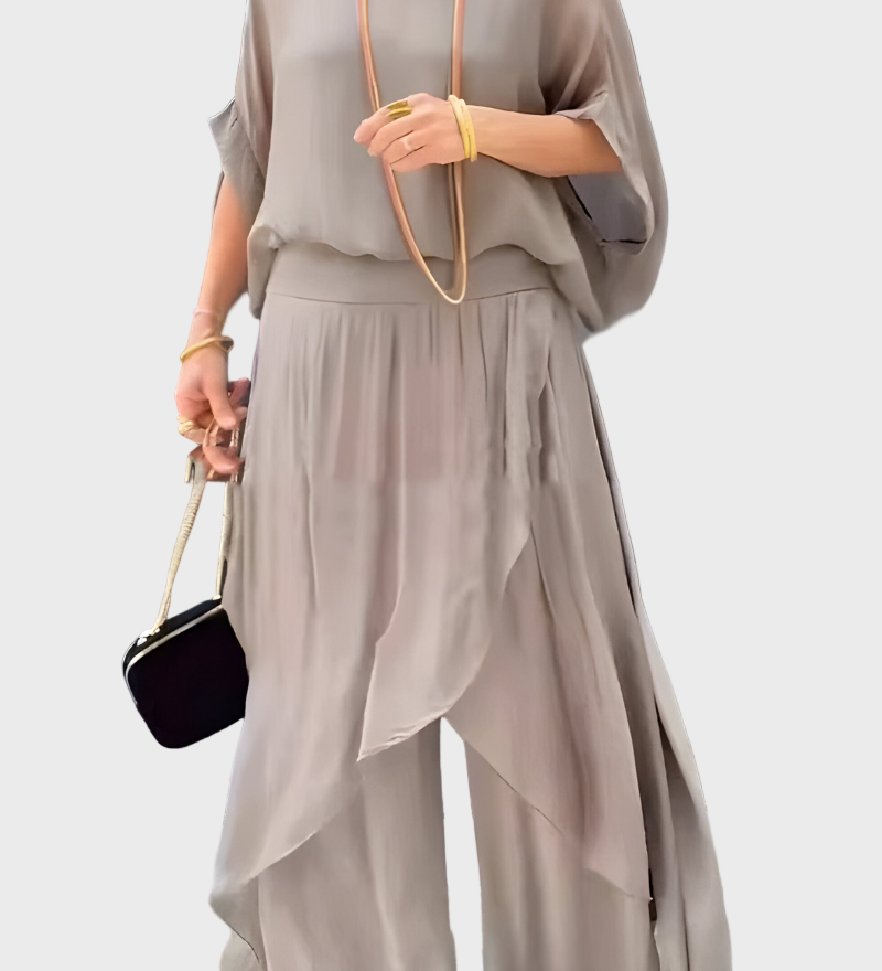 Šifoninis dviejų dalių komplektas: sijonas ir suplyšusios plačios kelnės.