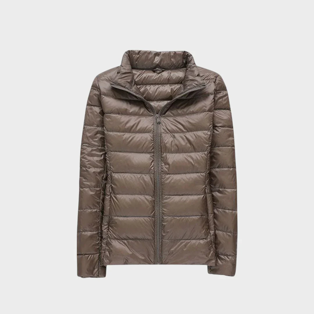 Ela - Nauja ultralengva striukė su baltais ančių plunksnomis