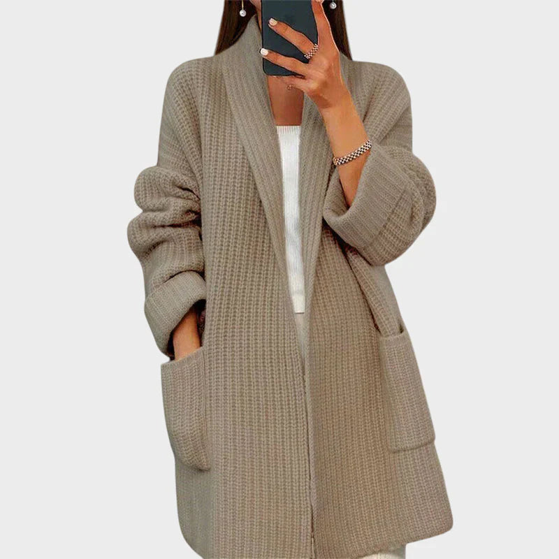 Taja - vilnonis megztinis su kišenėmis