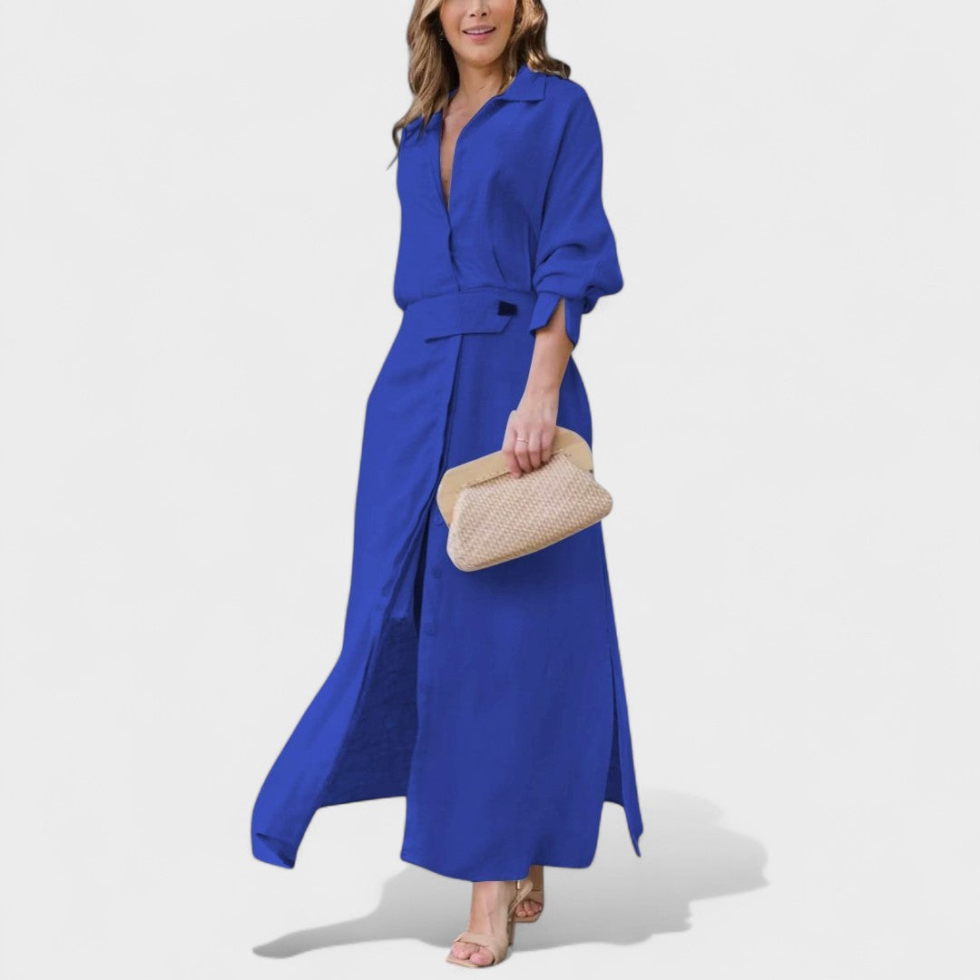 Gordana - Elegantiška ilga suknelė su V formos iškirpte ypatingam renginiui.