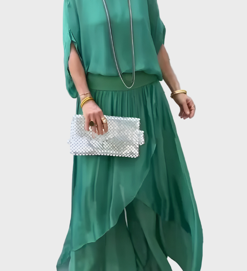 Šifoninis dviejų dalių komplektas: sijonas ir suplyšusios plačios kelnės.