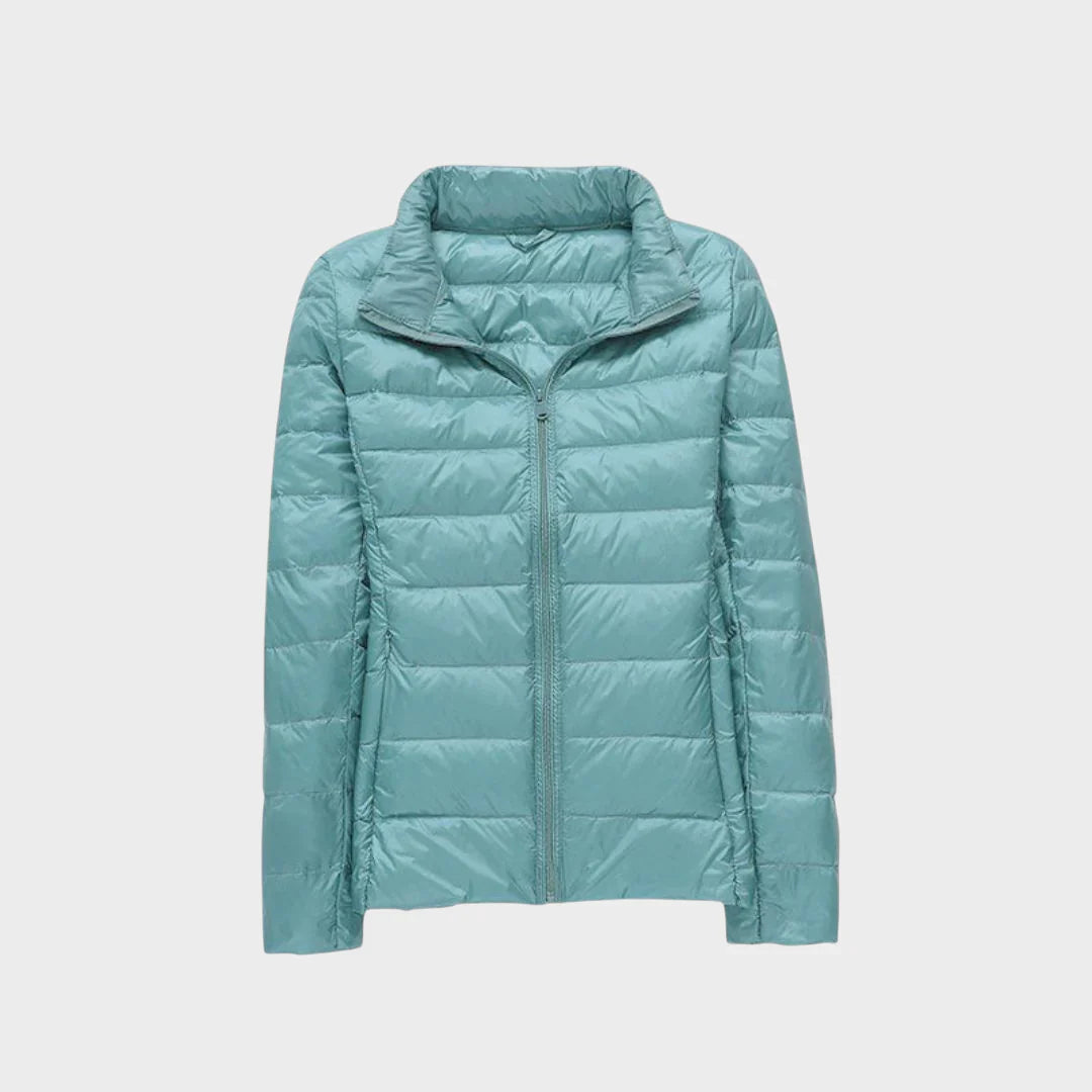 Ela - Nauja ultralengva striukė su baltais ančių plunksnomis