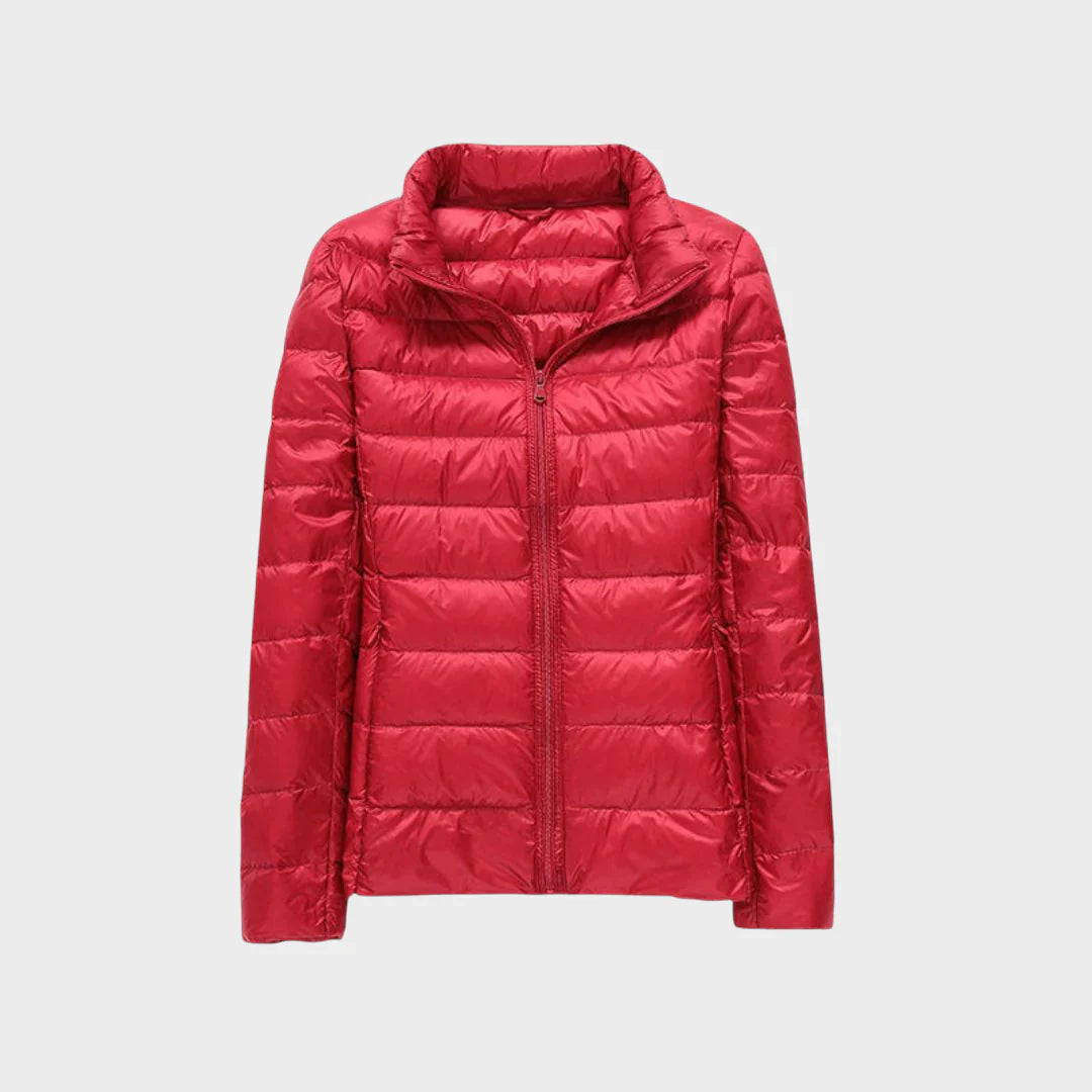 Ela - Nauja ultralengva striukė su baltais ančių plunksnomis