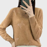 Megztinis su drugelių motyvu